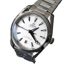 Load image into Gallery viewer, Silver Omega watch with white face on a dark background