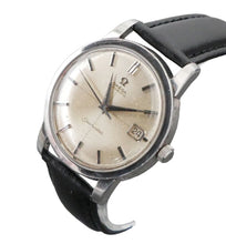 Load image into Gallery viewer, Vintage Omega watch with black leather strap on a gray background