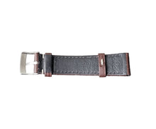 Load image into Gallery viewer, Black leather watch strap with silver buckle on a gray surface
