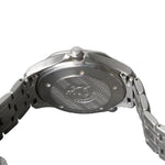 Close-up of the back of a stainless steel wristwatch with a metal link bracelet, showing an engraved wavy pattern and the brand name 'RODAN' on the case.