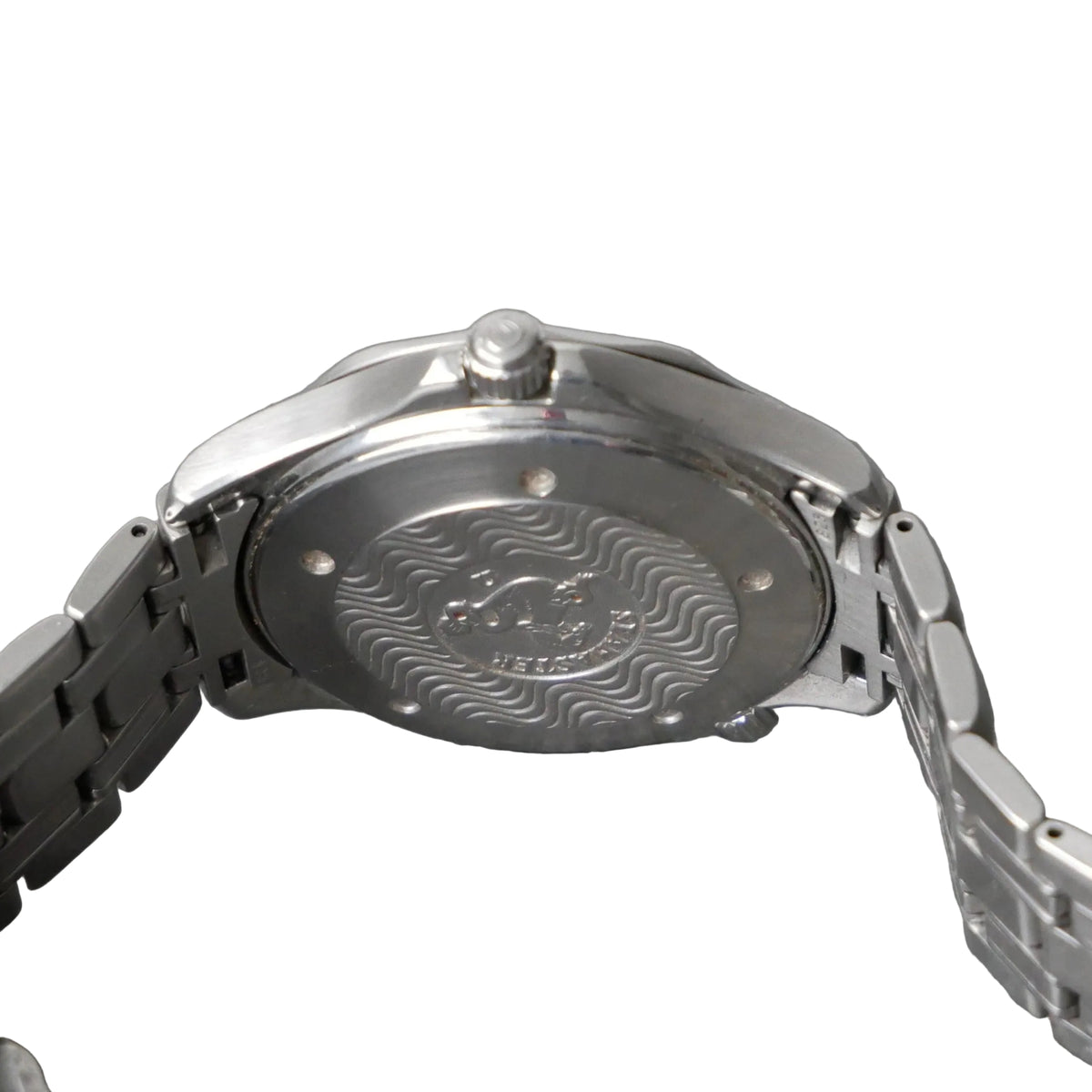 Close-up of the back of a stainless steel wristwatch with a metal link bracelet, showing an engraved wavy pattern and the brand name 'RODAN' on the case.