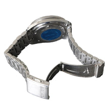Load image into Gallery viewer, Close-up of a watch with a metallic band on a gray surface
