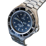 Omega watch with blue dial and silver metal strap on a gray background