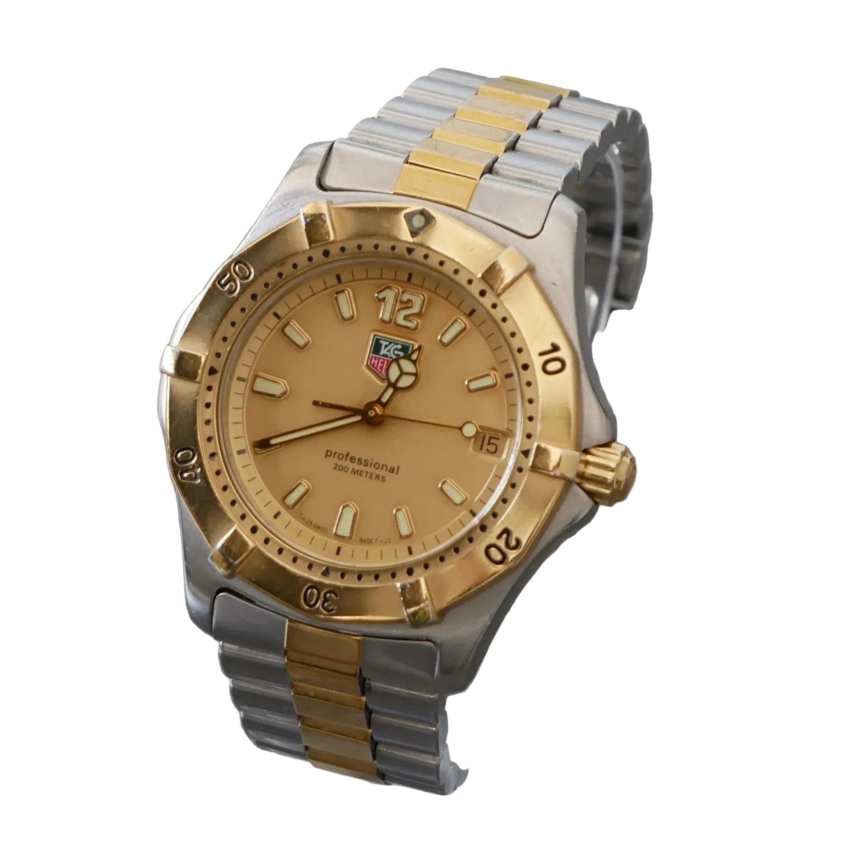 Two-tone silver and gold watch on a gray background