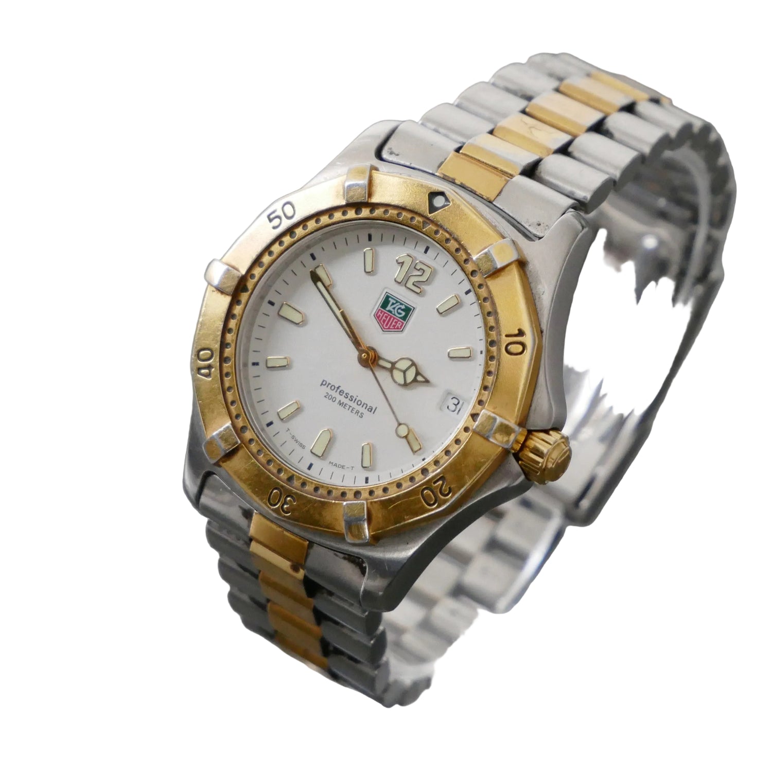 Two-tone silver and gold watch with a white face on a gray background