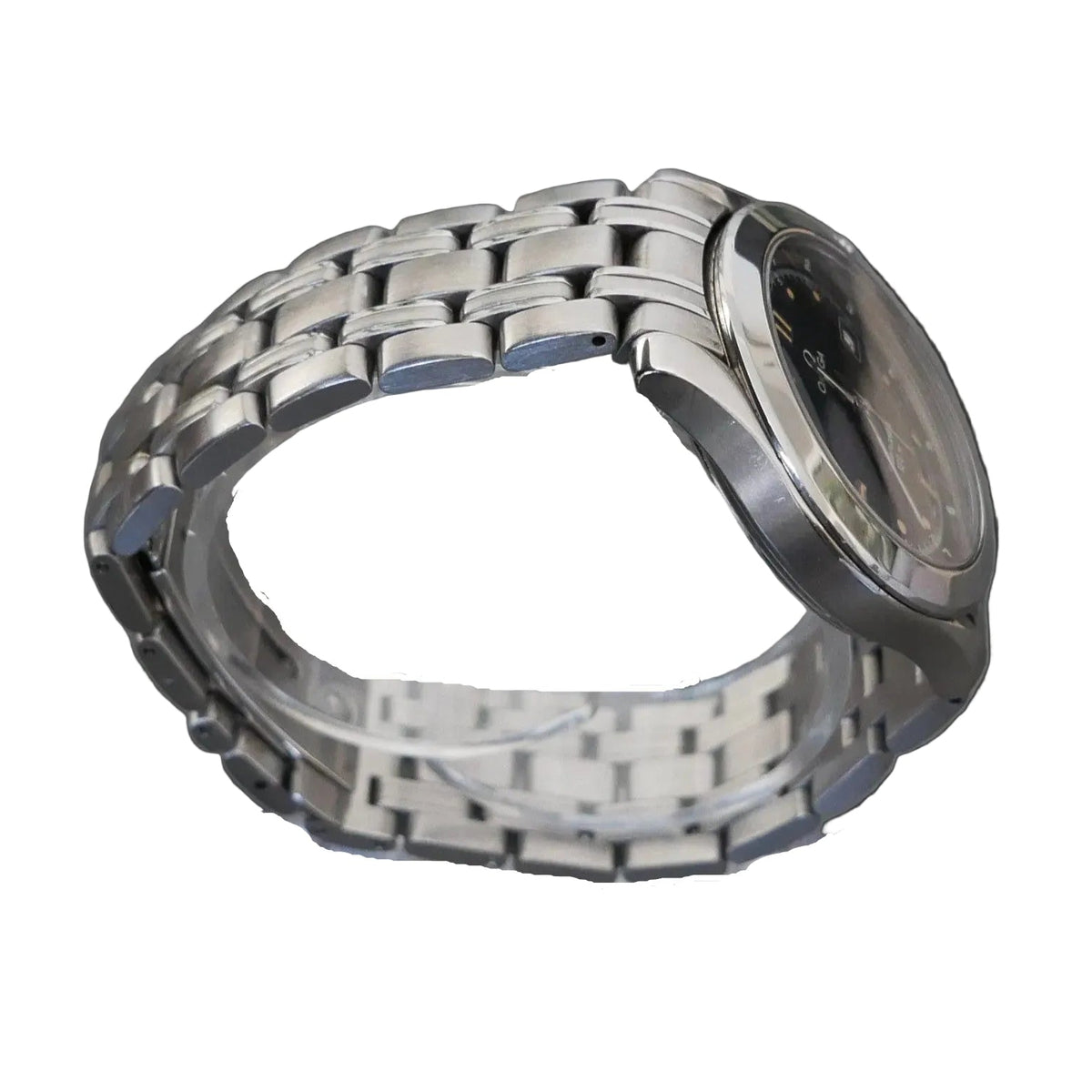Silver watch on a clear stand against a gray background