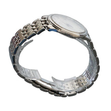 Load image into Gallery viewer, Silver watch on a clear stand with a gray background
