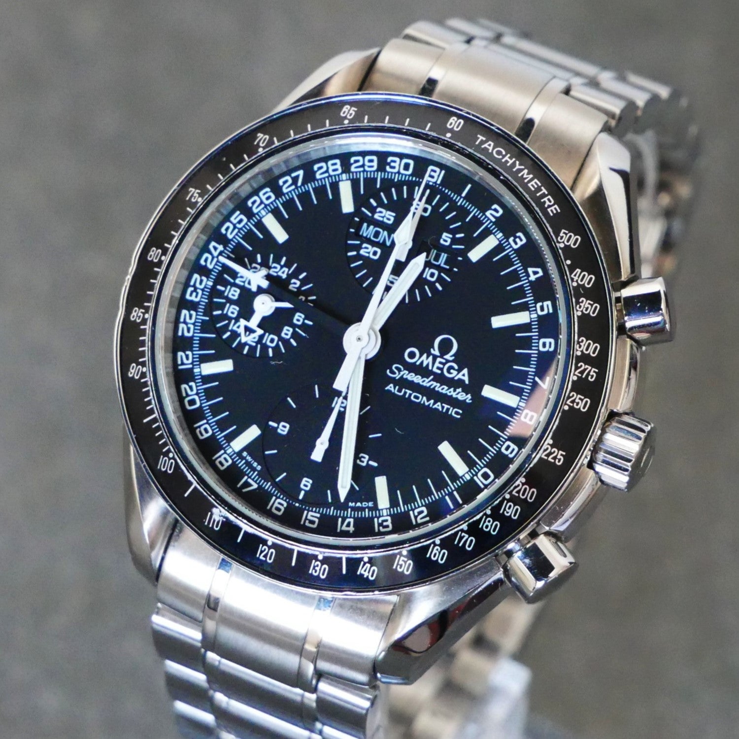 Omega Speedmaster, Triple date, 39mm, Automatic Chronograph, model 3520.50.00 - Mark 40,