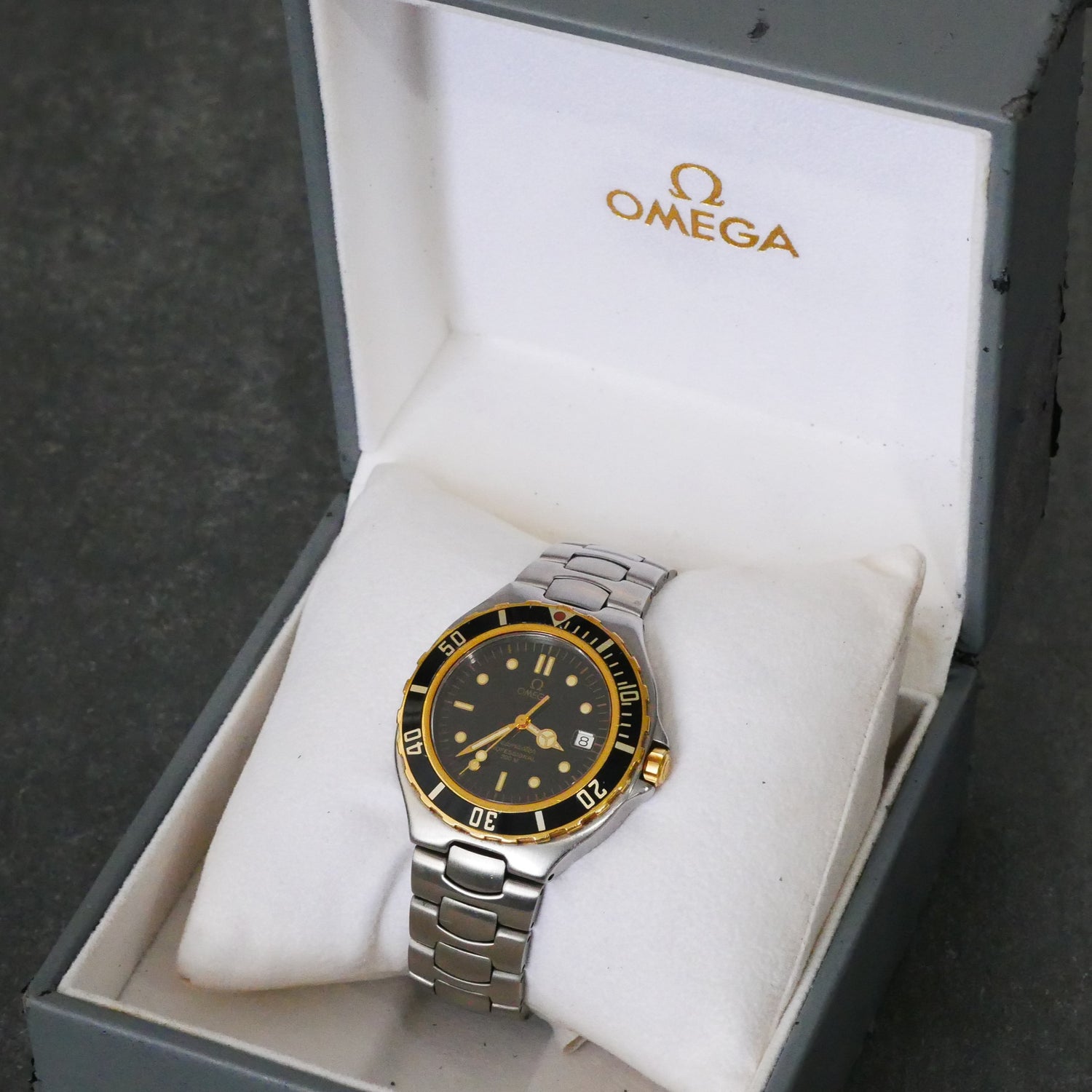 Omega Seamaster 200m (Pre-bond, vintage), 36mm, Black and Gold Dial, Quartz (In-Stock Item)